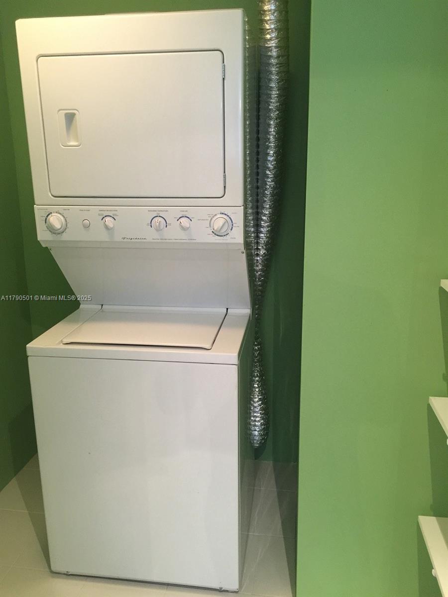 1881 79th Street Causeway, Unit 1106 North Bay Village, FL 33141 - Photo 20 of 20 a utility room with dryer and washer