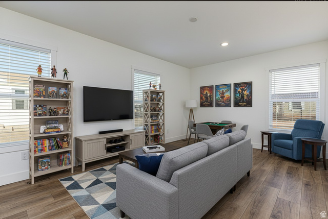 749 Riddle Drive Fredonia, AZ 86022 - Photo 6 of 41 Living area featuring dark wood-style floors, healthy amount of natural light, and recessed lighting