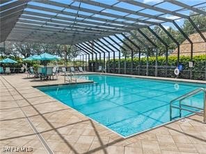 3057 Waterview Point Naples, FL 34120 - Photo 25 of 31 a view of a swimming pool with a yard