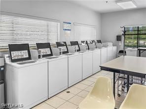 3057 Waterview Point Naples, FL 34120 - Photo 30 of 31 a living room with furniture and window