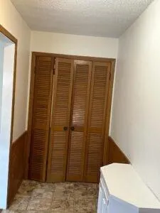 a bathroom with a shower and a sink