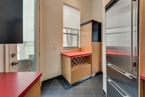 a hallway with washer and dryer