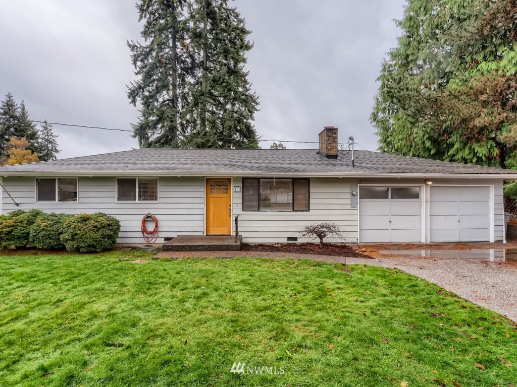 102 233rd Place Southwest Bothell, WA 98021 - Photo 1 of 26 a front view of house with yard and green space