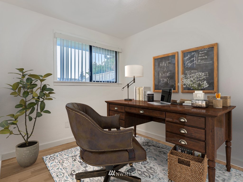 102 233rd Place Southwest Bothell, WA 98021 - Photo 14 of 26 a living room with furniture a potted plant and a window