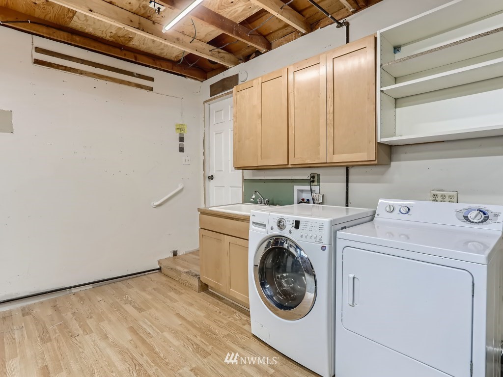 102 233rd Place Southwest Bothell, WA 98021 - Photo 20 of 26 a utility room with dryer and washer