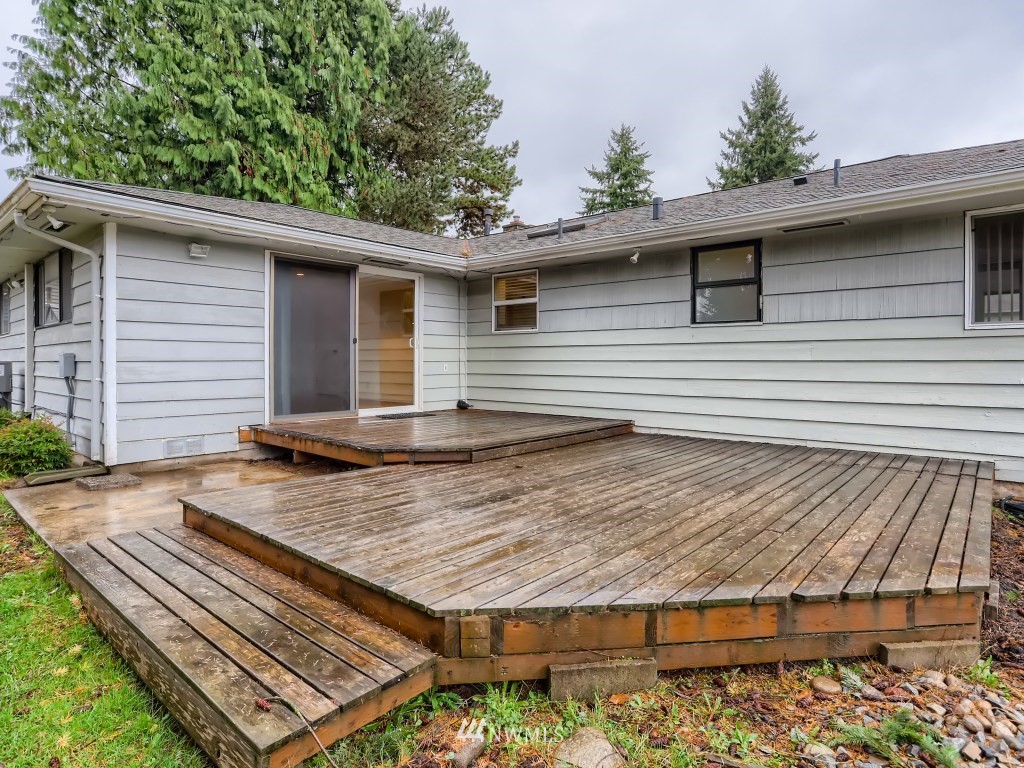 102 233rd Place Southwest Bothell, WA 98021 - Photo 23 of 26 a view of backyard with wooden deck