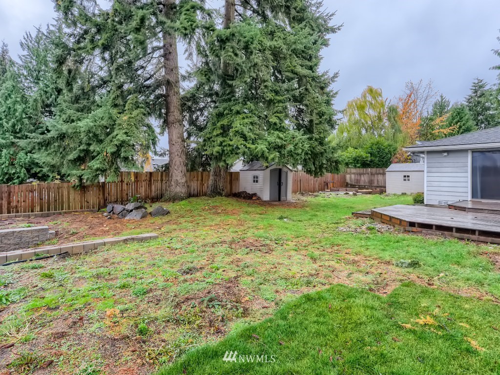 102 233rd Place Southwest Bothell, WA 98021 - Photo 24 of 26 a view of a backyard with a garden