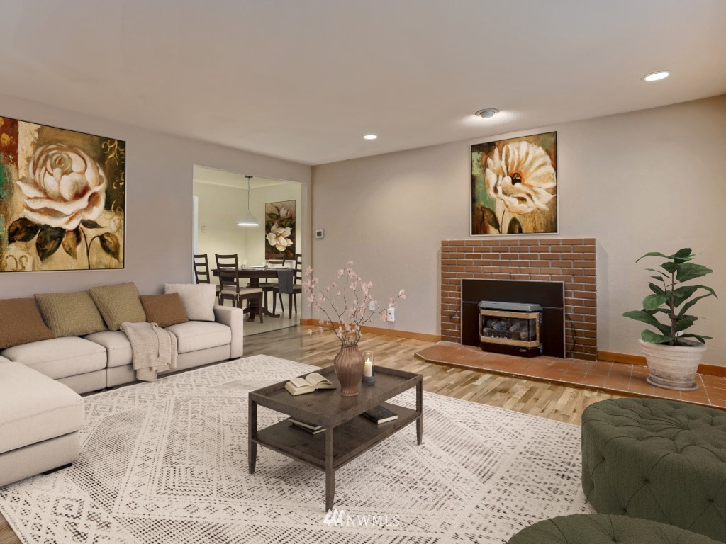 102 233rd Place Southwest Bothell, WA 98021 - Photo 4 of 26 a living room with furniture and a fireplace