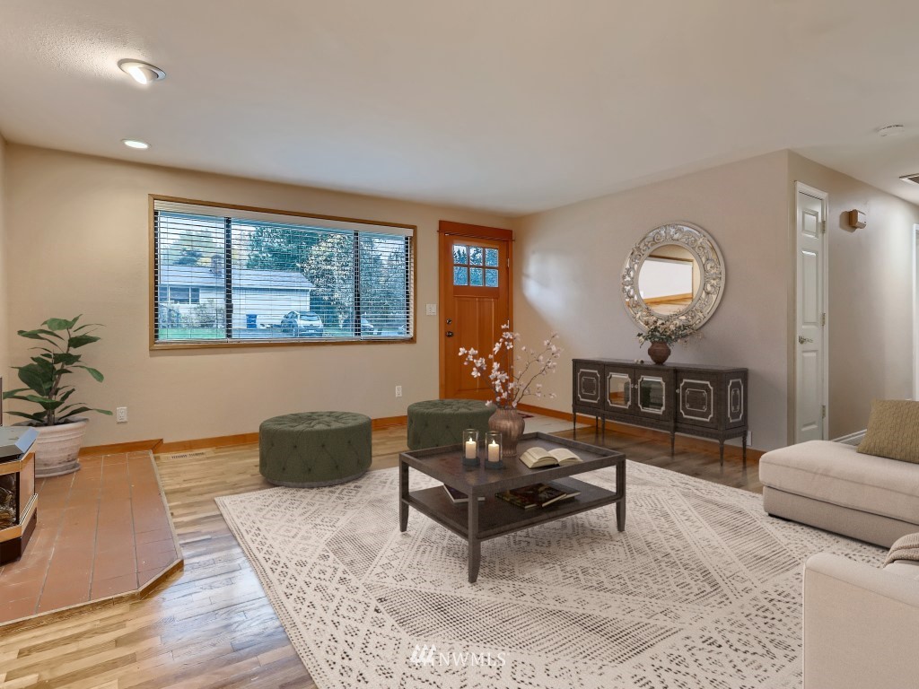 102 233rd Place Southwest Bothell, WA 98021 - Photo 6 of 26 a living room with furniture and a window
