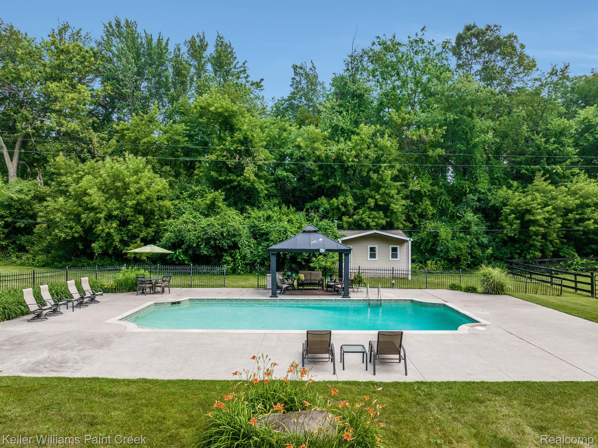 4165 Sheldon Road Rochester, MI 48306 - Photo 46 of 74 Pool shed behind pergola