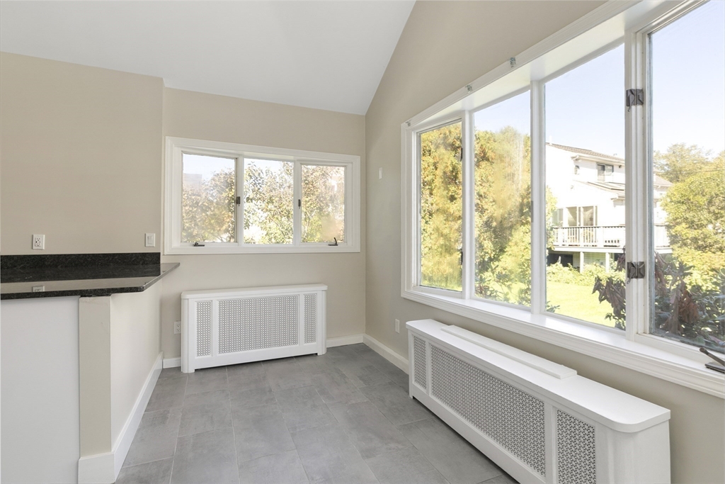 15 South Fairview Street, Unit 3 Boston, MA 02131 - Photo 11 of 29 a view of an empty room with a window