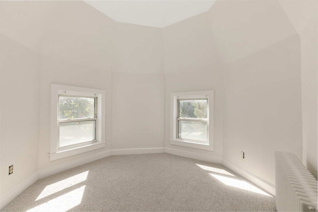 15 South Fairview Street, Unit 3 Boston, MA 02131 - Photo 20 of 29 an empty room with windows