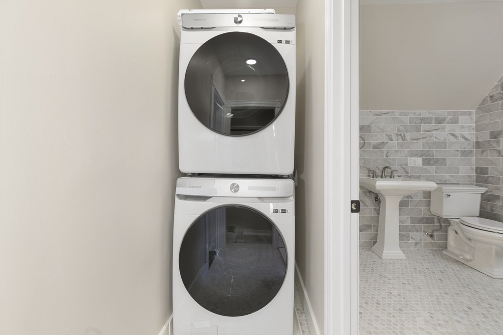 15 South Fairview Street, Unit 3 Boston, MA 02131 - Photo 22 of 29 a utility room with dryer and washer