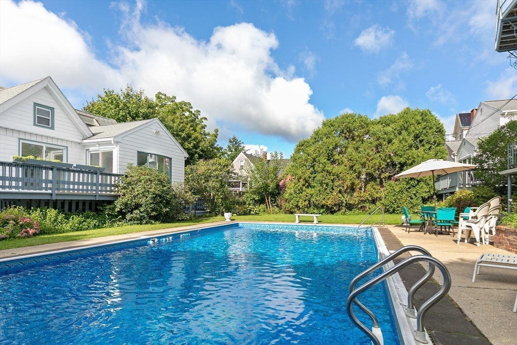 15 South Fairview Street, Unit 3 Boston, MA 02131 - Photo 26 of 29 a view of swimming pool with outdoor seating and hardwood floor