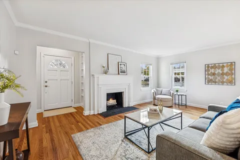 a living room with furniture and a couch
