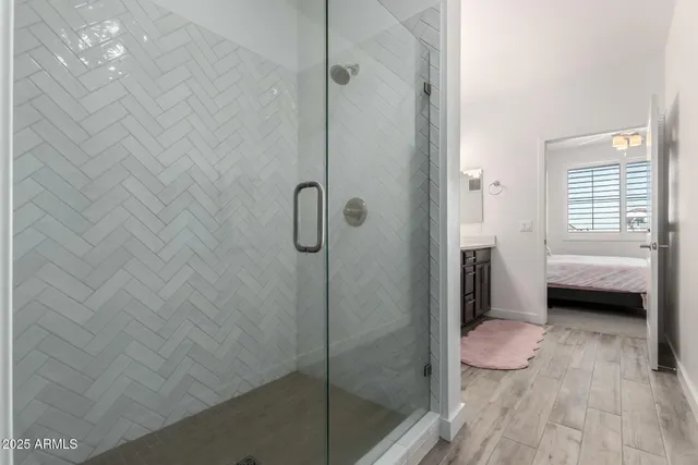 a bathroom with a shower and a toilet