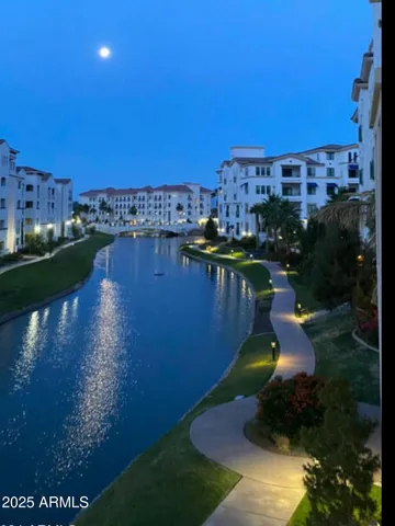 a view of a lake with a yard