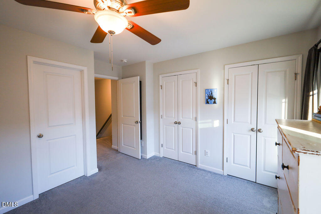 230 South Raleigh Street Angier, NC 27501 - Photo 33 of 38 a view of empty room with a ceiling fan
