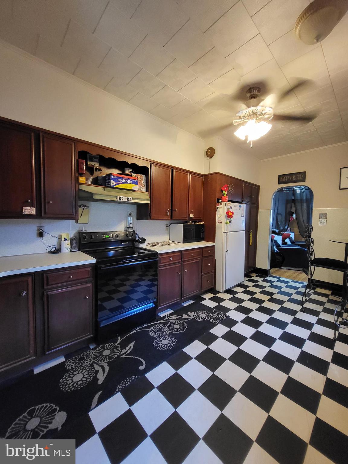 402 Morgantown Road Reading, PA 19611 - Photo 15 of 47 a kitchen with stainless steel appliances granite countertop a sink stove and refrigerator