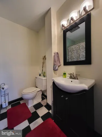 a bathroom with a sink and a toilet