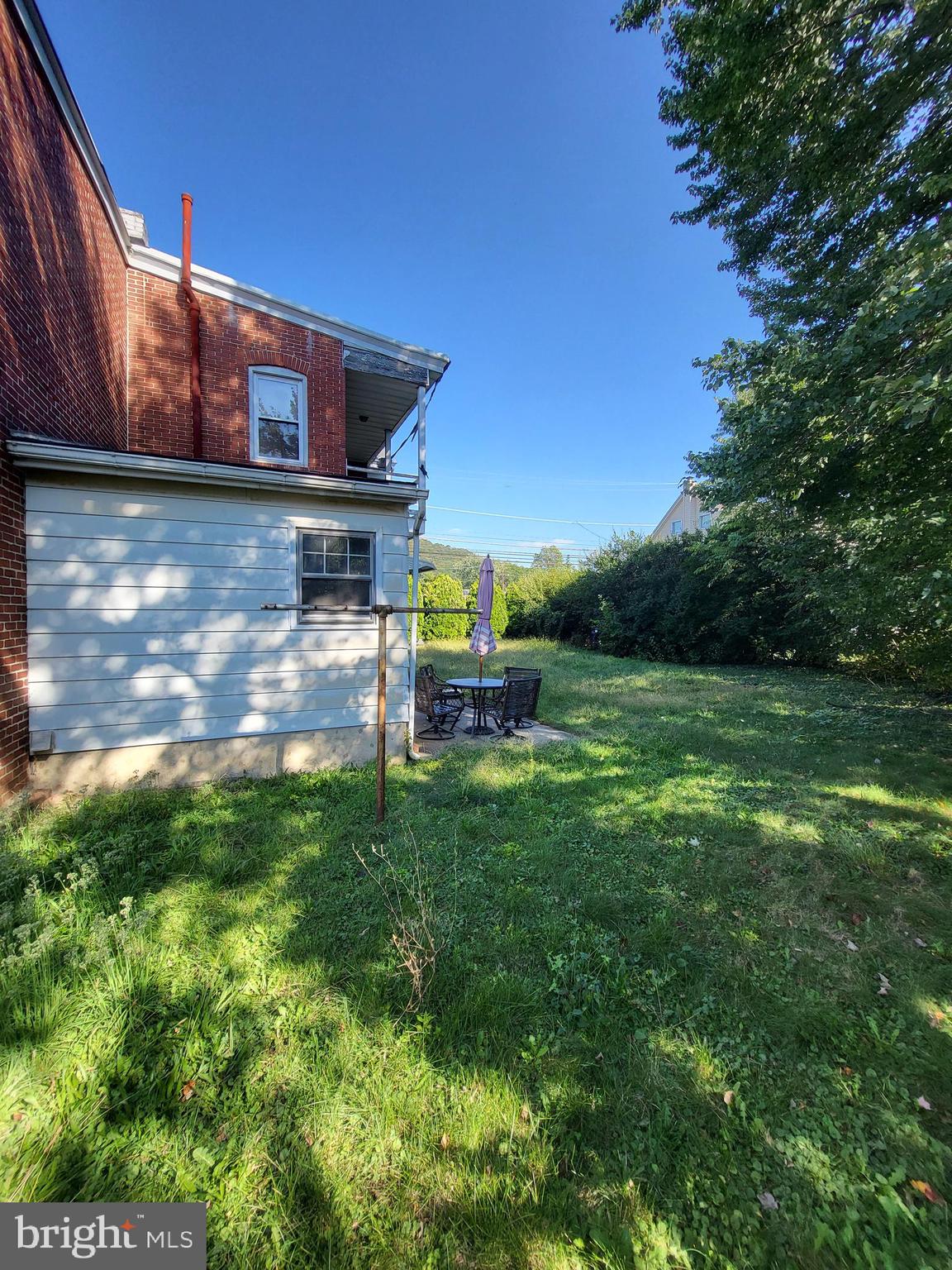 402 Morgantown Road Reading, PA 19611 - Photo 21 of 47 a backyard of a house with lots of green space