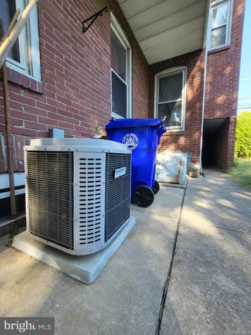a red brick building with glass windows