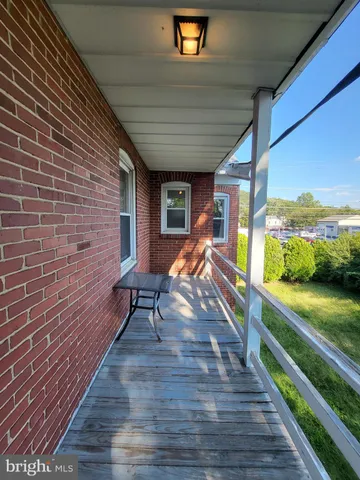 a view of swimming pool with seating space
