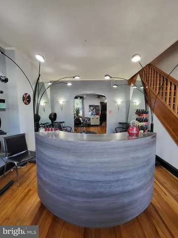 a view of living room with wooden floor