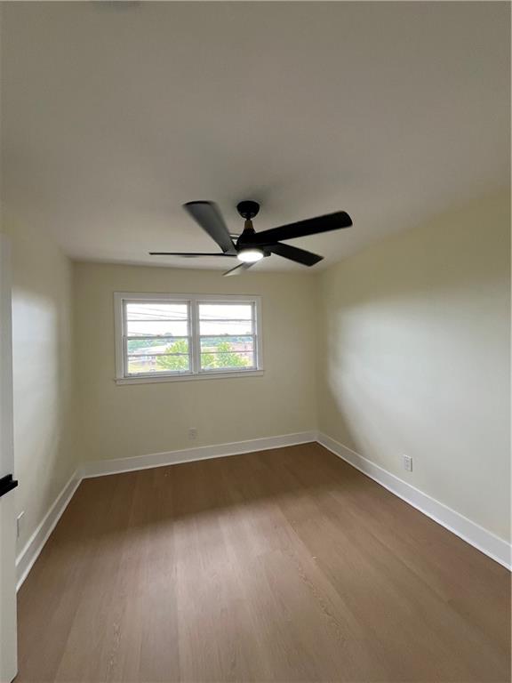 1645 Metropolitan Parkway Southwest, Unit A Atlanta, GA 30310 - Photo 13 of 26 an empty room with a window
