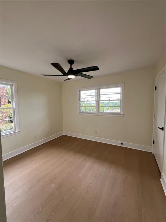 1645 Metropolitan Parkway Southwest, Unit A Atlanta, GA 30310 - Photo 15 of 26 a view of an empty room with a window
