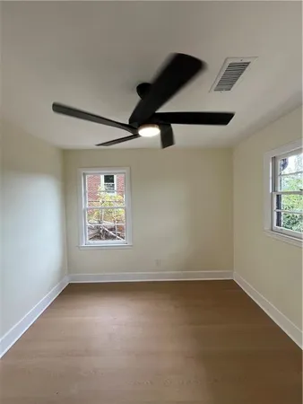 an empty room with windows