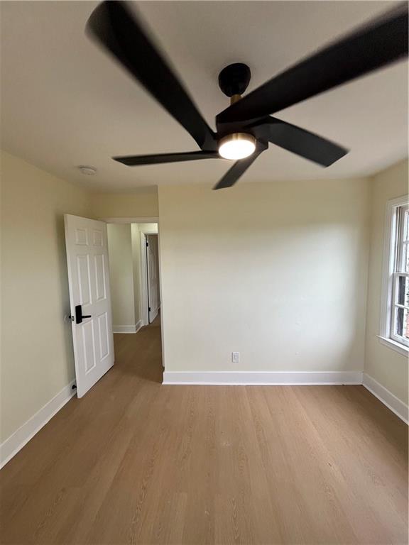 1645 Metropolitan Parkway Southwest, Unit A Atlanta, GA 30310 - Photo 17 of 26 an empty room with windows