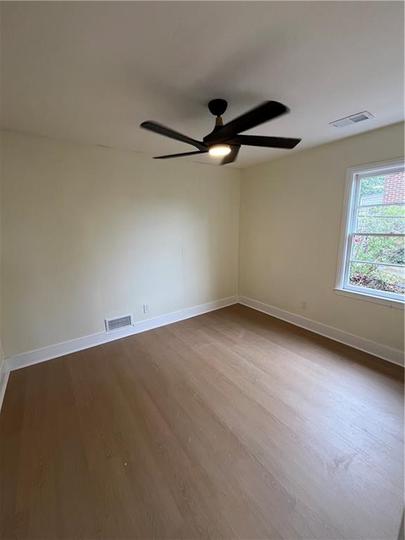1645 Metropolitan Parkway Southwest, Unit A Atlanta, GA 30310 - Photo 21 of 26 an empty room with a window