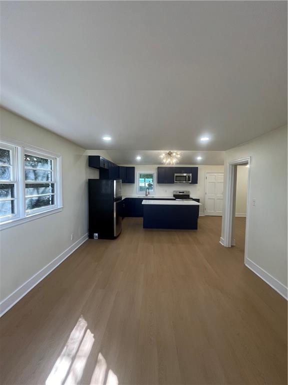 1645 Metropolitan Parkway Southwest, Unit A Atlanta, GA 30310 - Photo 7 of 26 a living room with furniture and a window
