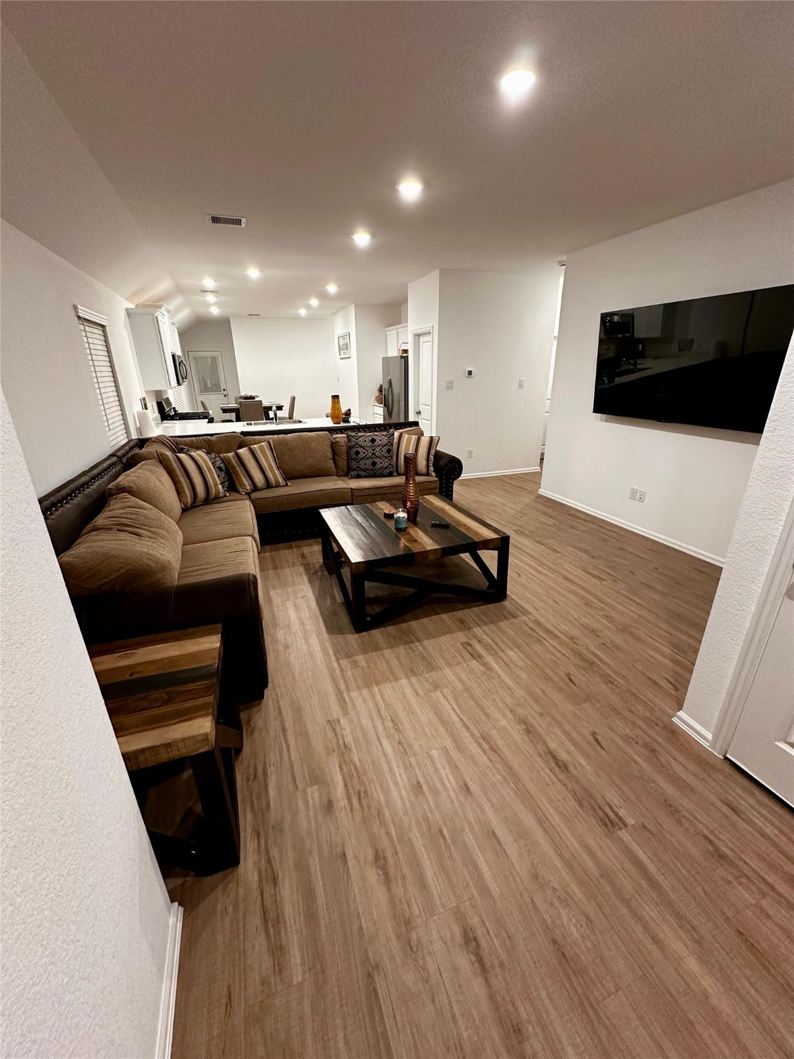 2023 Foxtail Crk Court Crosby, TX 77532 - Photo 4 of 22 a living room with furniture and a wooden floor