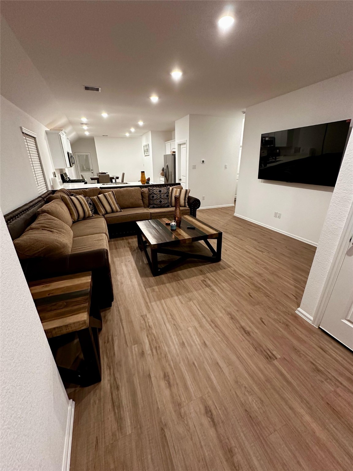 2023 Foxtail Crk Court Crosby, TX 77532 - Photo 5 of 22 a living room with furniture and a flat screen tv