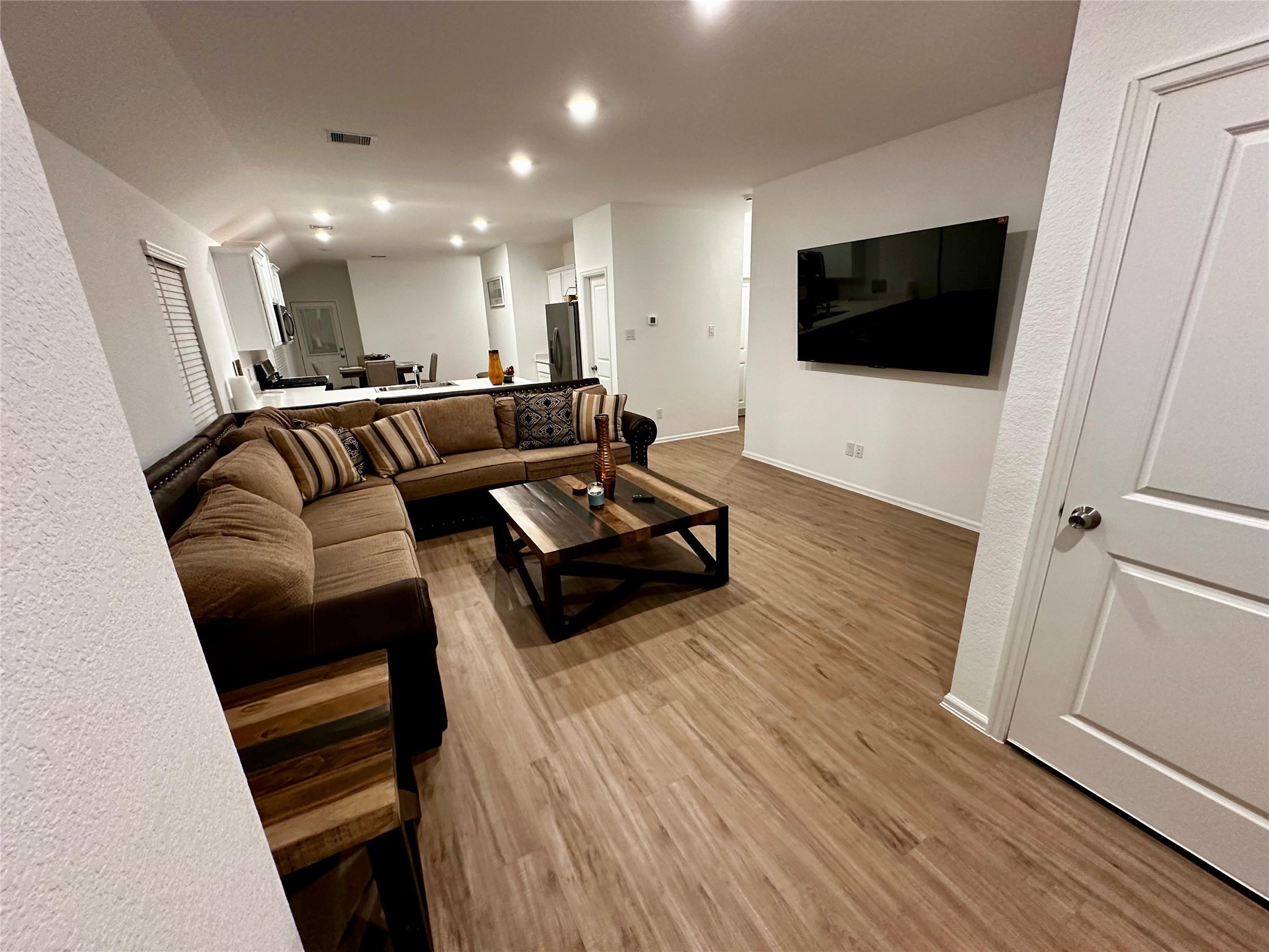 2023 Foxtail Crk Court Crosby, TX 77532 - Photo 10 of 22 a living room with furniture and a flat screen tv