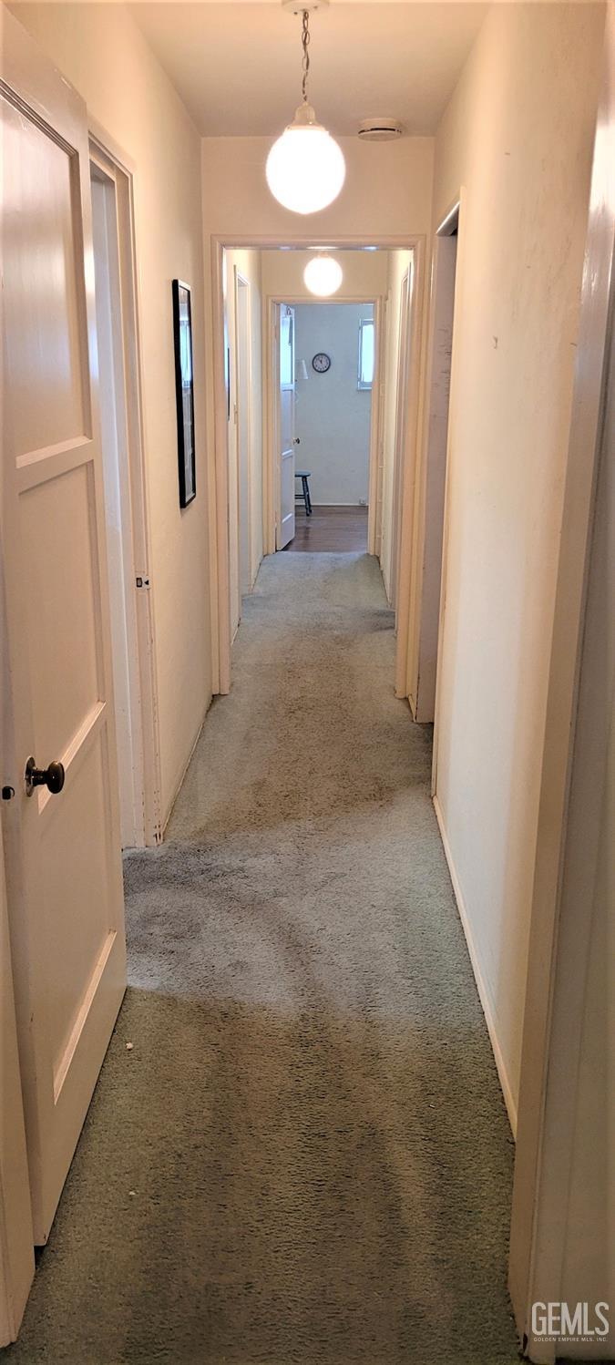 Undisclosed Address Delano, CA 93215 - Photo 12 of 23 a view of a bathroom with a sink and mirror