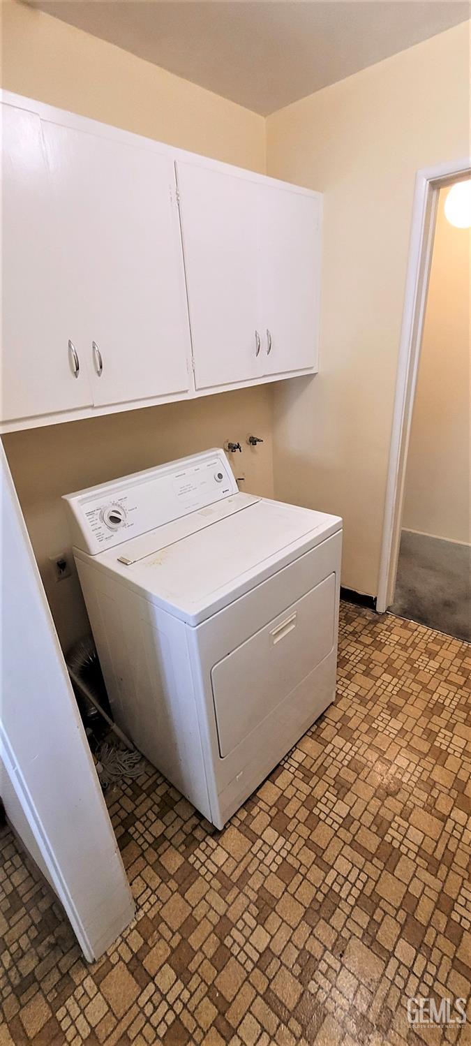 Undisclosed Address Delano, CA 93215 - Photo 17 of 23 a room with a bed