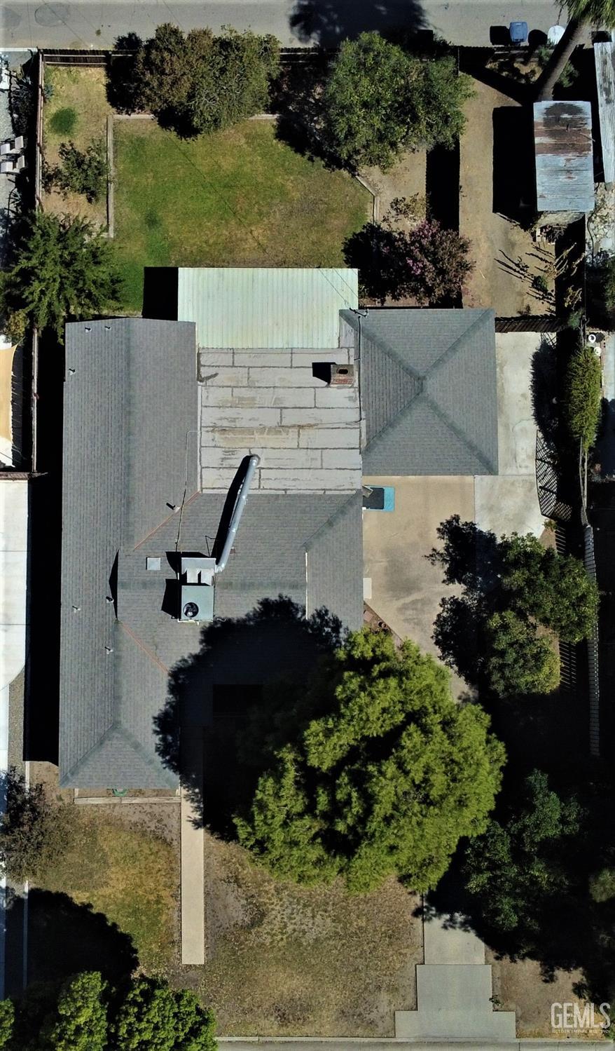 Undisclosed Address Delano, CA 93215 - Photo 23 of 23 an aerial view of a house with a yard