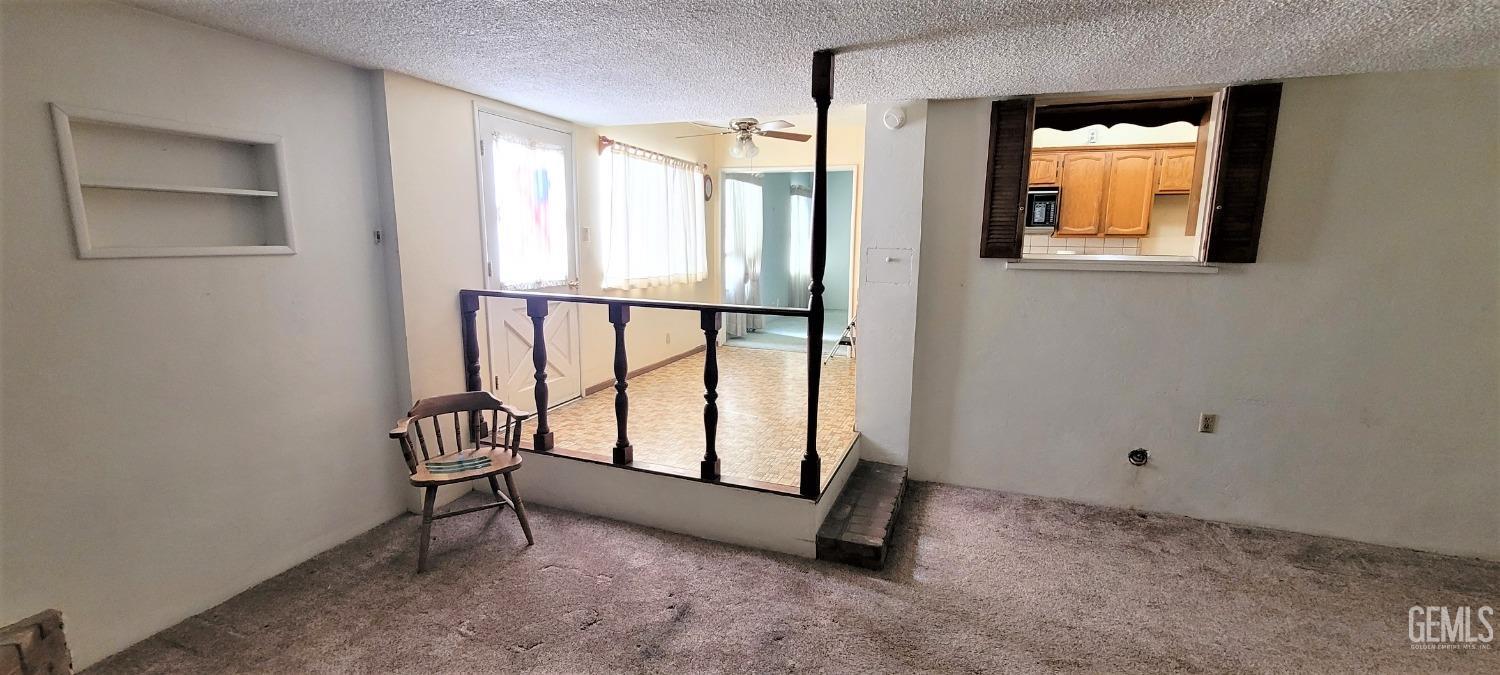 Undisclosed Address Delano, CA 93215 - Photo 8 of 23 an empty room with windows and closet