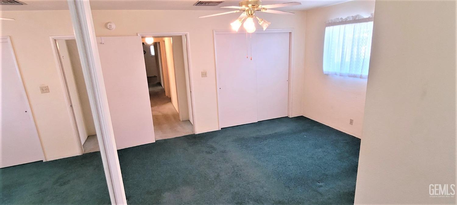 Undisclosed Address Delano, CA 93215 - Photo 10 of 23 an empty room with windows