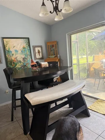 a view of a workspace with furniture