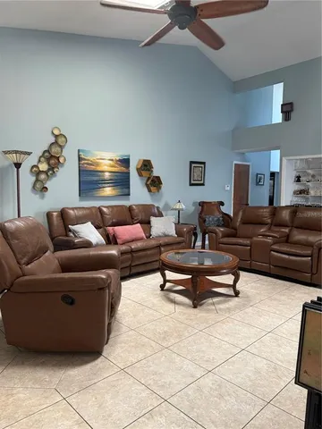 a living room with furniture and a couch