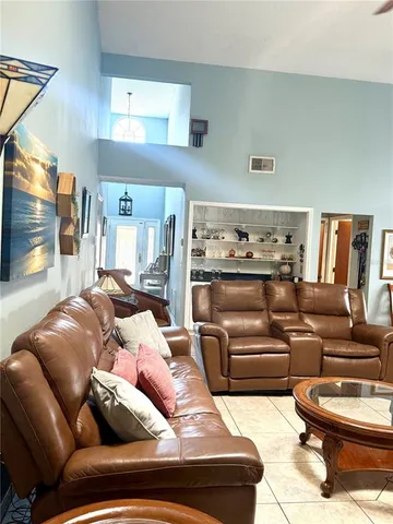 a living room with furniture and a couch