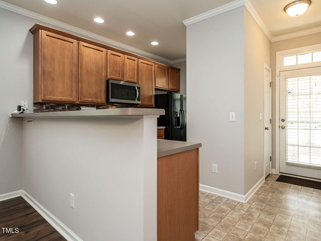8237 Belneath Court Raleigh, NC 27613 - Photo 4 of 27 004-1280x960-bar-sitting-and-kitchen