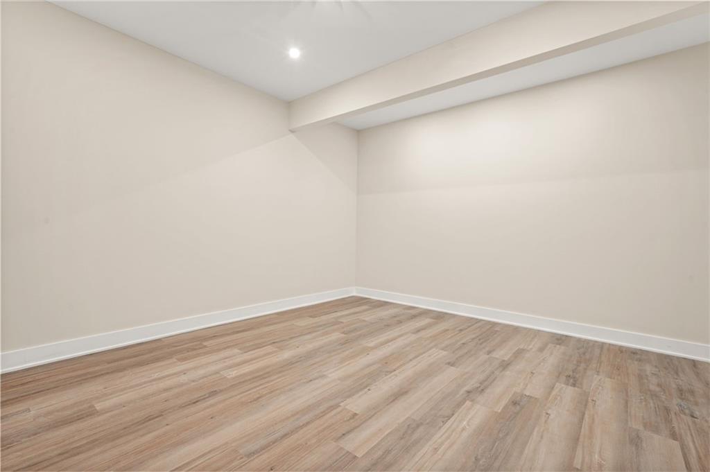 237 Altoona Place Southwest Atlanta, GA 30314 - Photo 37 of 63 a view of an empty room with wooden floor