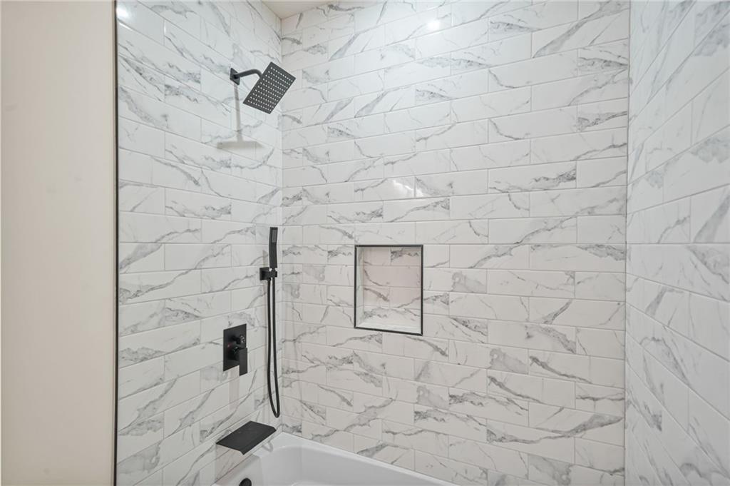 237 Altoona Place Southwest Atlanta, GA 30314 - Photo 41 of 63 a bathroom with a shower
