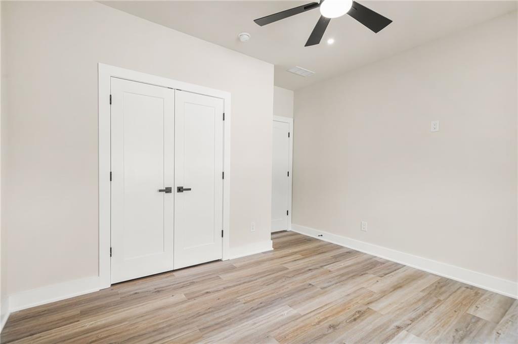 237 Altoona Place Southwest Atlanta, GA 30314 - Photo 44 of 63 wooden floor in an empty room