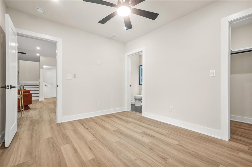 237 Altoona Place Southwest Atlanta, GA 30314 - Photo 52 of 63 wooden floor in an empty room with a window